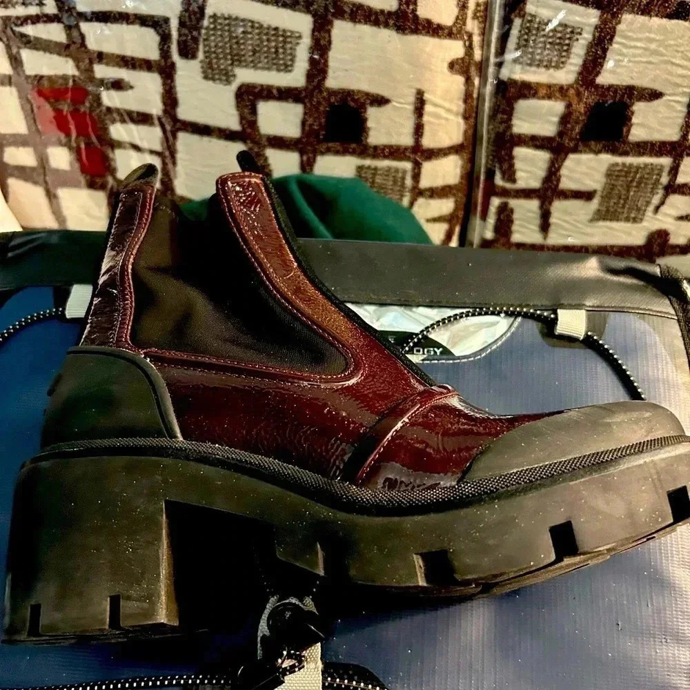 Tory Burch booties in burgundy. Worn once. Size 8.